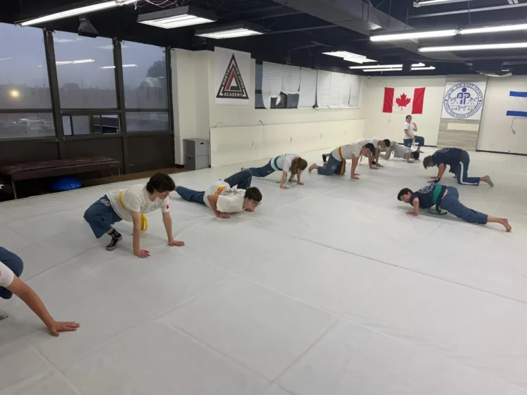 Students doing floor conditioning during class